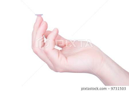 Woman holds a Contact Lens 9731503