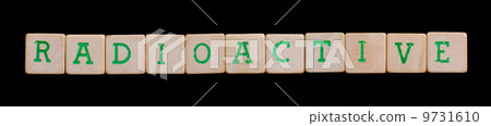 Green letters on old wooden blocks (radioactive) Green letters on old wooden blocks (radioactive) 9731610