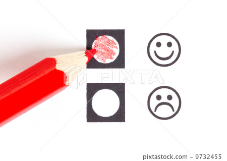 Red pencil choosing the right smiley Red pencil choosing the right smiley 9732455