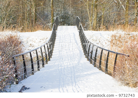 Metal bridge covered in snow Metal bridge covered in snow 9732743