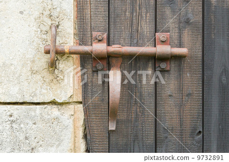 Wrought iron lock old wooden door Wrought iron lock old wooden door 9732891