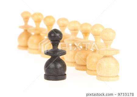 Old handcarved chess pieces isolated 9733178