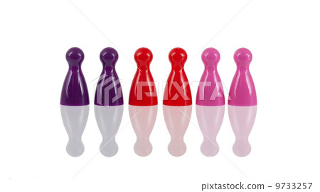 Different colored pawns isolated 9733257