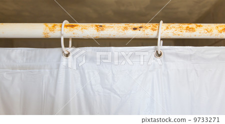 White shower curtain in the bathroom 9733271