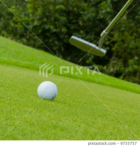 Golf ball on front of a driver 9733757