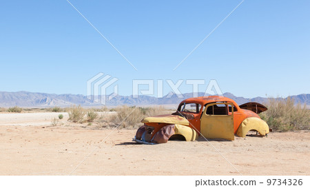Abandoned car in the Namib Desert 9734326