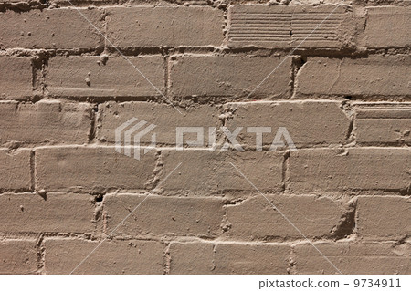 Yellow paint brick wall background Yellow paint brick wall background 9734911