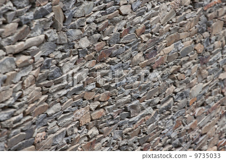 Wall of slate, very typical Mediterranean construction 9735033