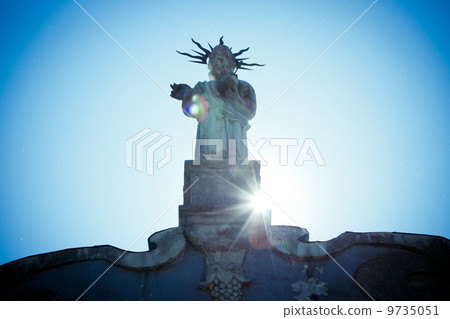 Statue on one of Tallinn church 9735051