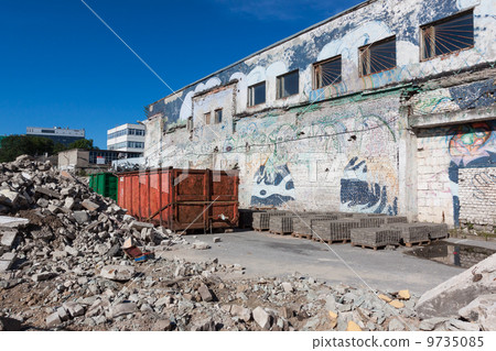 A skip full of rubble on construction site A skip full of rubble on construction site 9735085