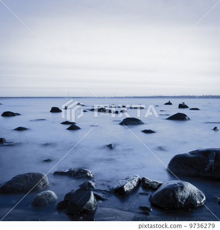 rocky coast in the evening. Long exposure shot rocky coast in the evening. Long exposure shot 9736279