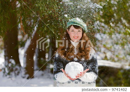 Beautiful young woman  wearing a cap 9741402