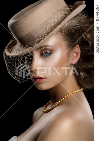 Charm. Retro Styled Romantic Woman in Vintage Brown Hat and Veil. Nostalgia 9744867
