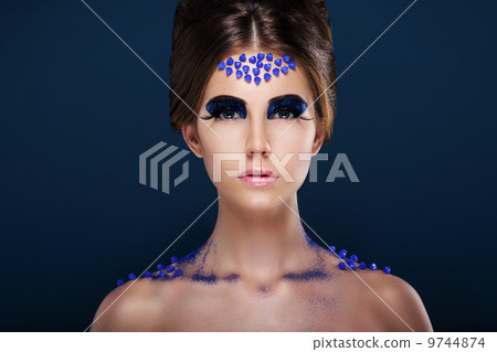 Fantasy. Artistic Woman with Fancy Creative Make-up. Glamour 9744874