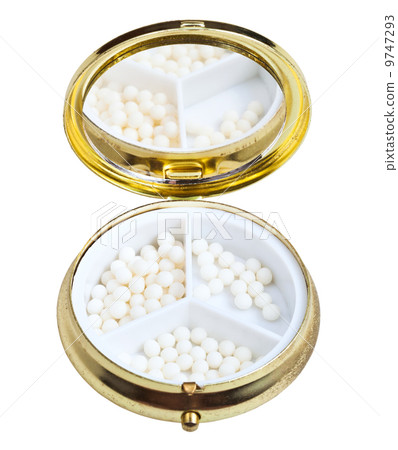 compact pill box with sugar homeopathy balls 9747293