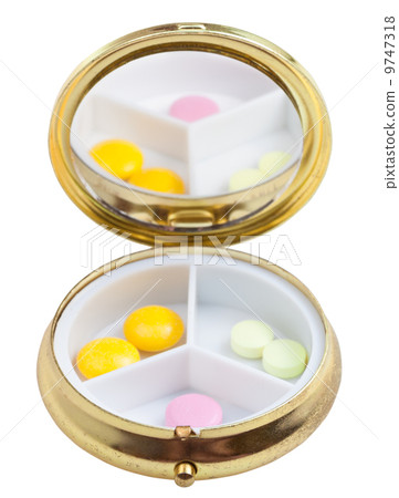 compact pill box with mirror and few tablets compact pill box with mirror and few tablets 9747318