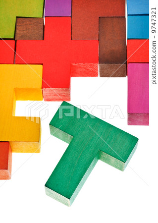 T-shaped piece in wooden multicoloured puzzle T-shaped piece in wooden multicoloured puzzle 9747321