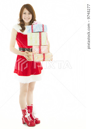 Santa girl with lots of gifts 9748277
