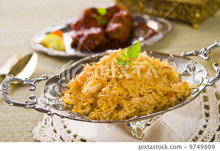 Briyani mutton rice papadam with traditional background Briyani mutton rice papadam with traditional background 9749809