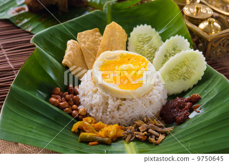 nasi lemak, a traditional malay curry paste rice dish served on nasi lemak, a traditional malay curry paste rice dish served on 9750645