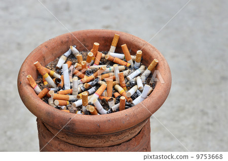 Cigarette addiction ashtray full 9753668
