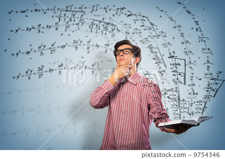 young scientist holding a book young scientist holding a book 9754346