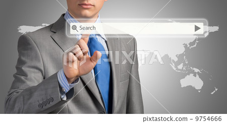 Businessman pushing on a touch screen 9754666