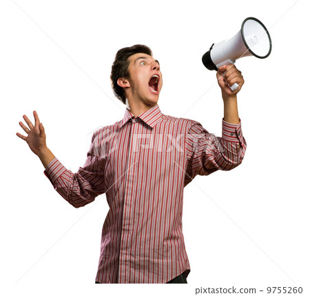 Portrait of a young man shouting using megaphone 9755260