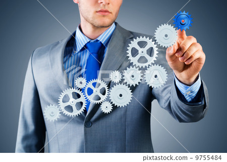 businessman touch the mechanism 9755484