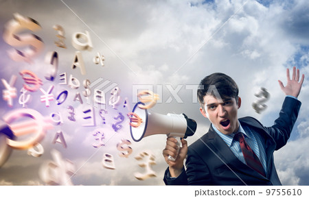 businessman shouting into a megaphone businessman shouting into a megaphone 9755610