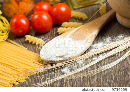pasta, tomatoes and flour on the spoon pasta, tomatoes and flour on the spoon 9756669