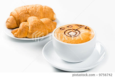 large cup of coffee and croissants on a plate 9756742