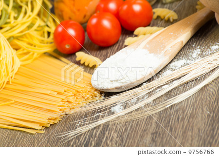 pasta, tomatoes and flour on the spoon pasta, tomatoes and flour on the spoon 9756766