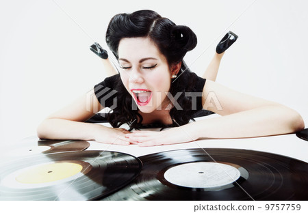 Sexy girl with phonography analogue record 9757759