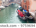 Two gondola in Venice near pier 9759694