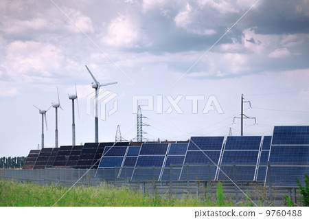 real solar panels and windmill 9760488