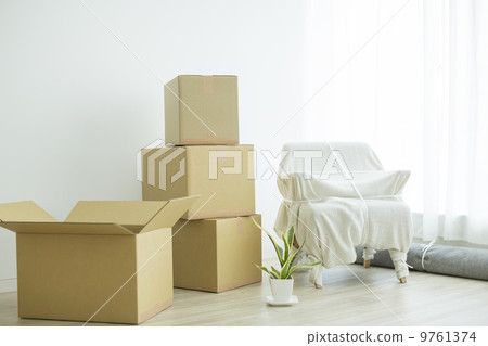 Moving luggage placed in the living room Moving luggage placed in the living room 9761374