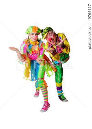 Two cheerful clowns in the soap bubbles isolated on a white background 9764117