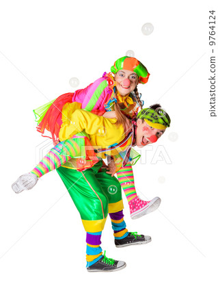 Two smiling clowns isolated over a white background Two smiling clowns isolated over a white background 9764124