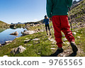 couple hiking in mountains 9765565