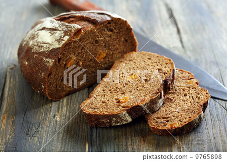 Rye bread with dried apricots and nuts. 9765898