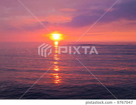 Sunset over the sea 9767047