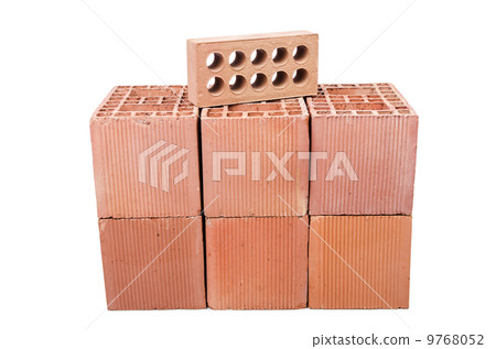 Stack of clay bricks isolated on white Stack of clay bricks isolated on white 9768052