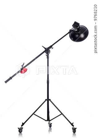 Studio light stand isolated on the white Studio light stand isolated on the white 9768210