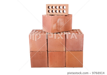 Stack of clay bricks isolated on white 9768914