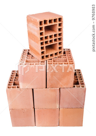 Stack of clay bricks isolated on white Stack of clay bricks isolated on white 9768983