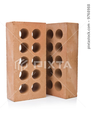 Stack of clay bricks isolated on white Stack of clay bricks isolated on white 9768988