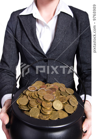 Woman holding pot of gold coins Woman holding pot of gold coins 9768989