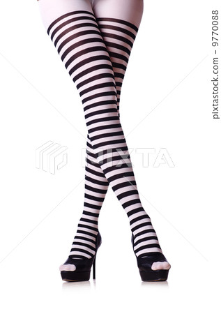 Woman legs in black and white stockings 9770088