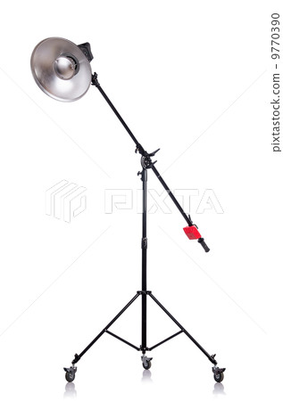 Studio light stand isolated on the white Studio light stand isolated on the white 9770390